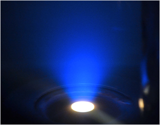 Process photo of the anodic arc evaporation of graphite