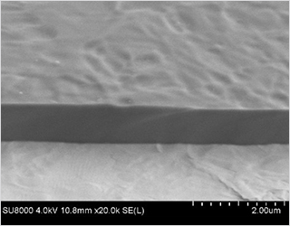 SEM image of a smooth and droplet-free ta-C layer on a steel substrate