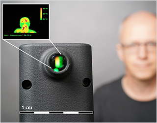 Portable system for displaying thermal images via power-saving OLED microdisplays