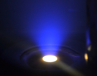 Process photo of the anodic arc evaporation of graphite
